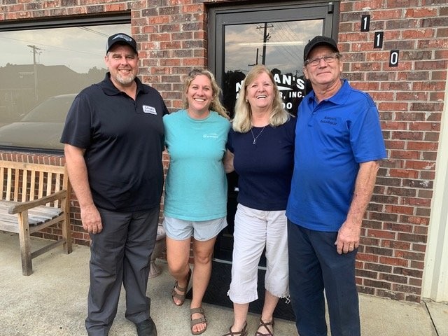 Nathan and Cindy Page with new auto repair shop owners