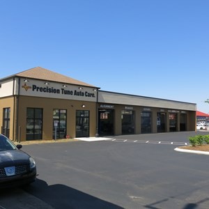 Exterior of Precision Tune Auto Care shop in Jacksonville, NC, highlighting the location at the crossroads of Western Boulevard and Commerce Road