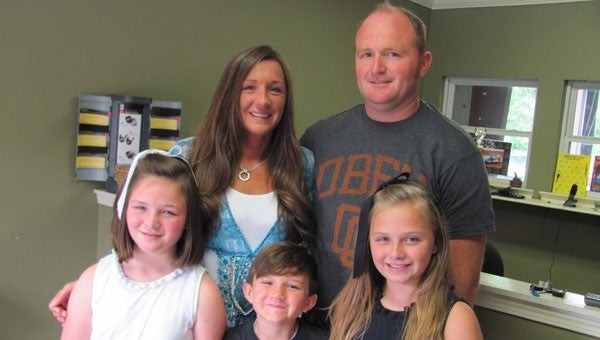 Front row from left, Morgan, Diesel and Sydney Jones. Back row from left, Kim and Chris Jones. (Contributed)