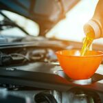Mechanic working on a car engine