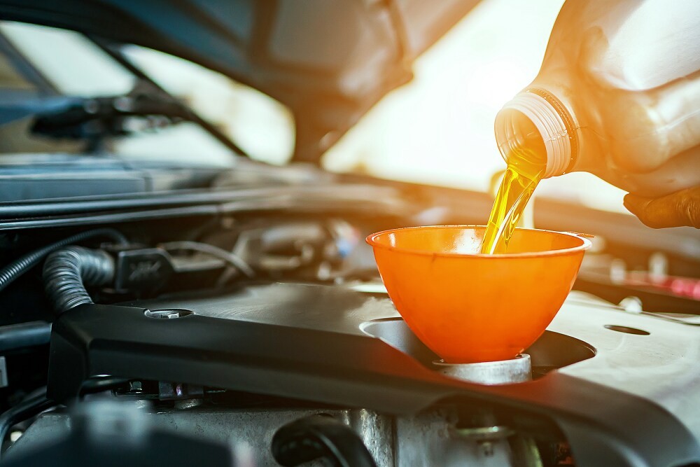 Mechanic working on a car engine