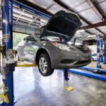 Mechanic Working on Car Engine