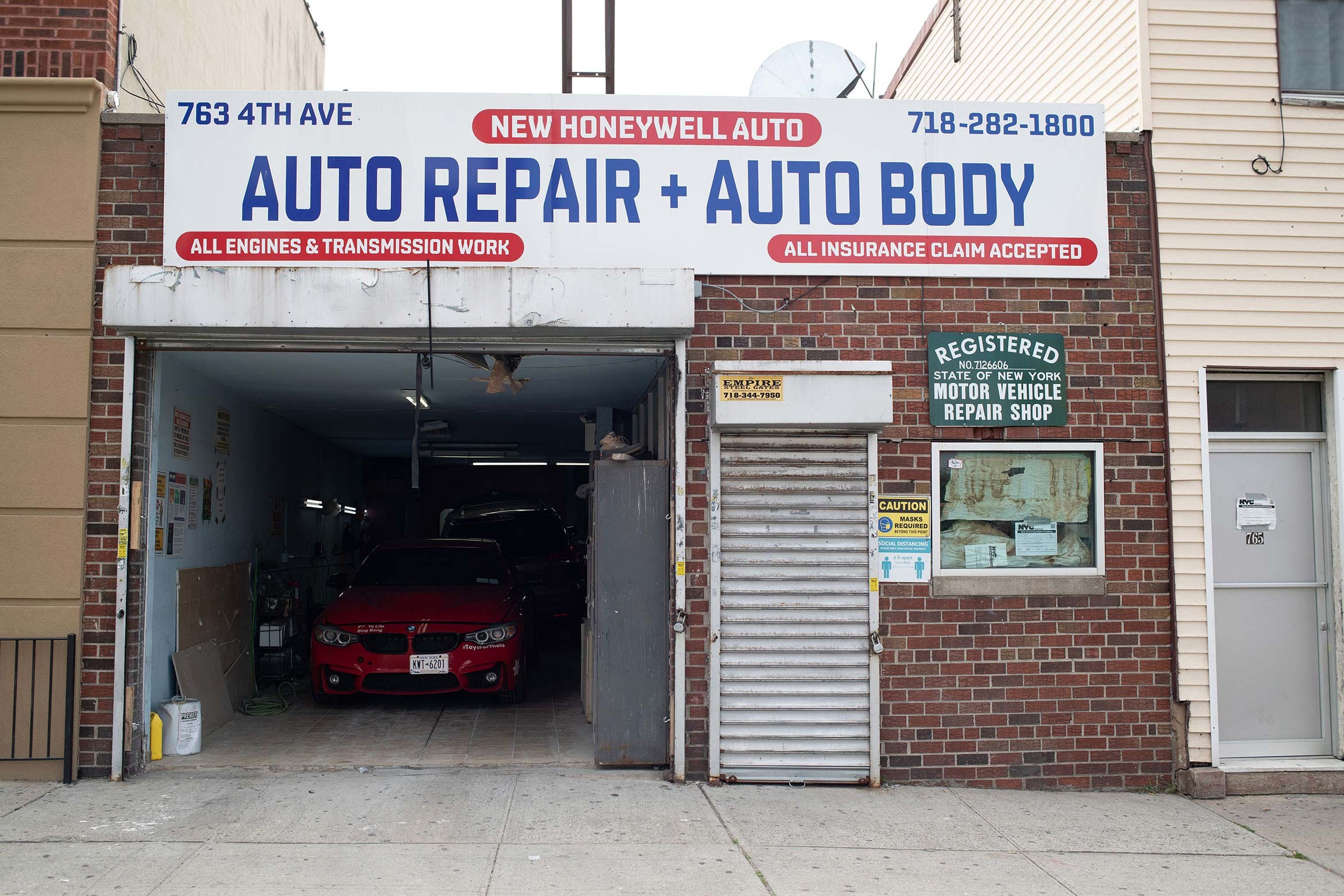 Inside view of a well-equipped auto repair shop, showcasing the workspace