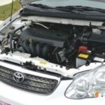 mechanic working on car