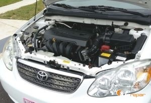 mechanic working on car