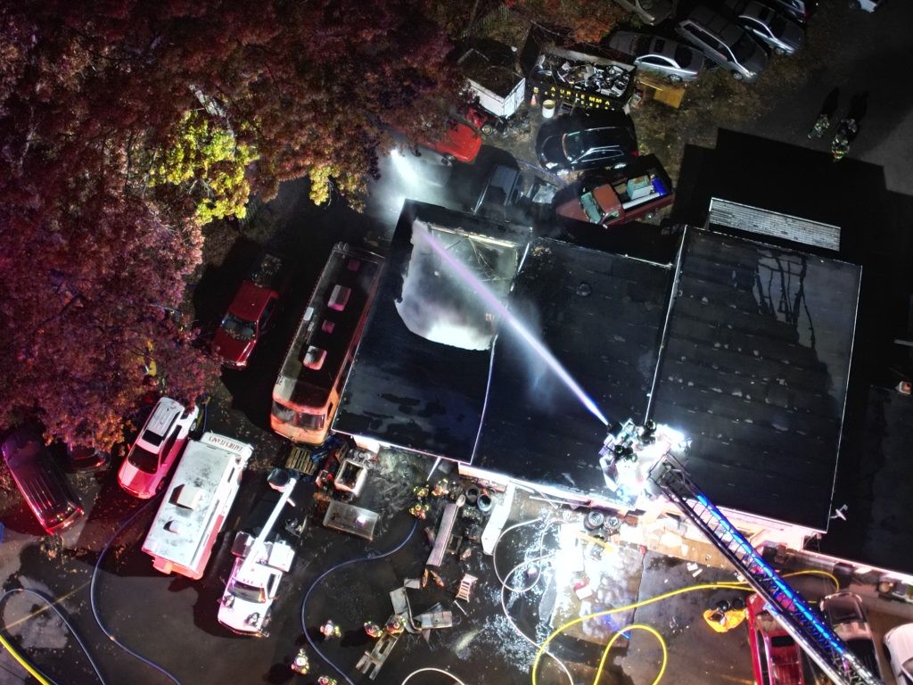 Aerial view of fire damage to an auto repair shop on Route 88, Brick Township, N.J.