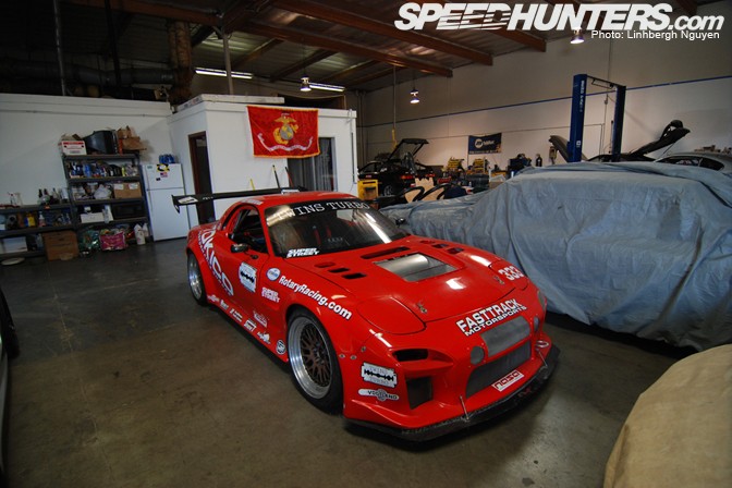 A well-equipped auto repair shop specializing in turbo twins, representing the entrepreneurial path for experienced technicians.