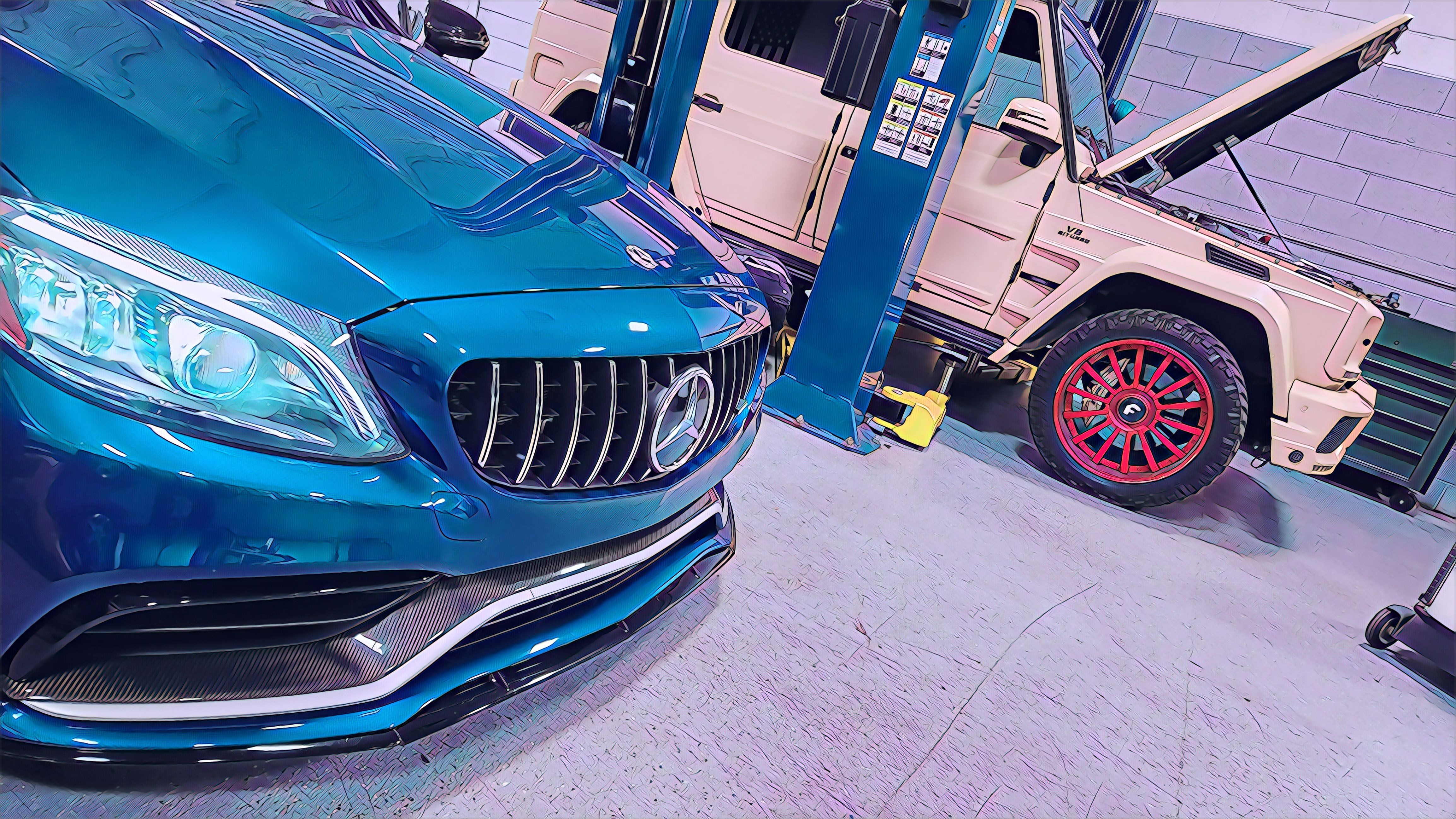 Equipment and tools are placed well inside auto service shop