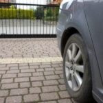 Mechanic working under car