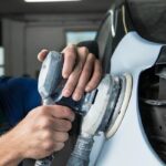 Car frame straightening process in an auto repair shop