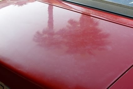 Car cover protecting a car from the elements