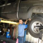 Mechanic working on a car