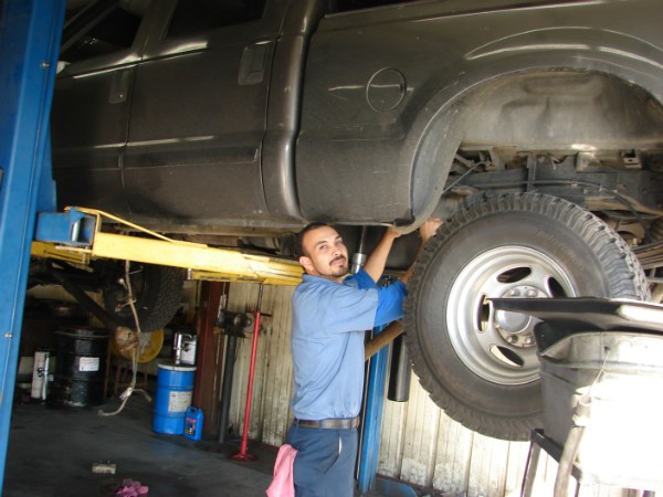 Mechanic working on a car