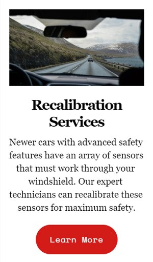 Technician using specialized tools for auto glass repair